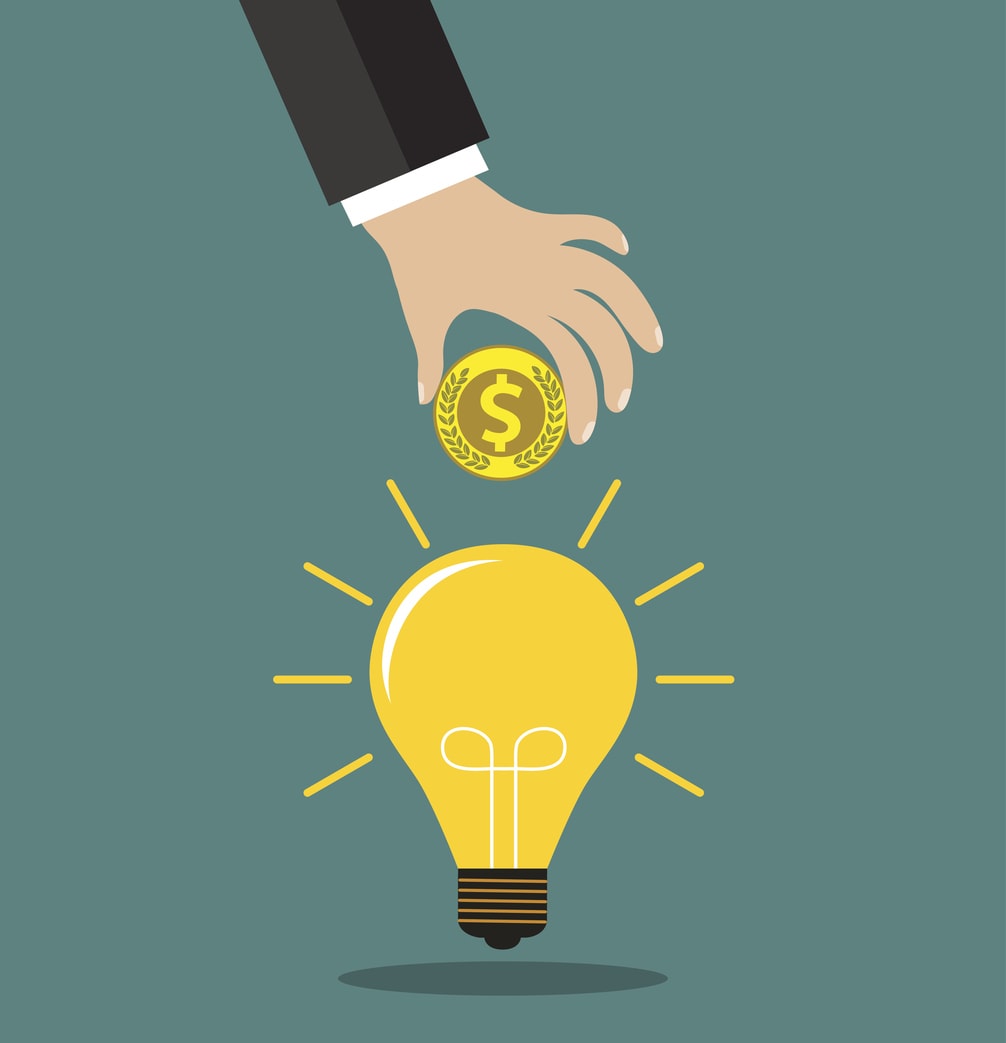 investing in ideas hand with coin