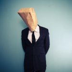 embarrassed-iStock-469567097 sad and ashamed businessman with bag over head