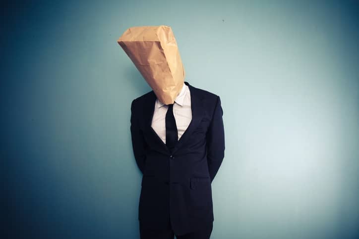 embarrassed-iStock-469567097 sad and ashamed businessman with bag over head