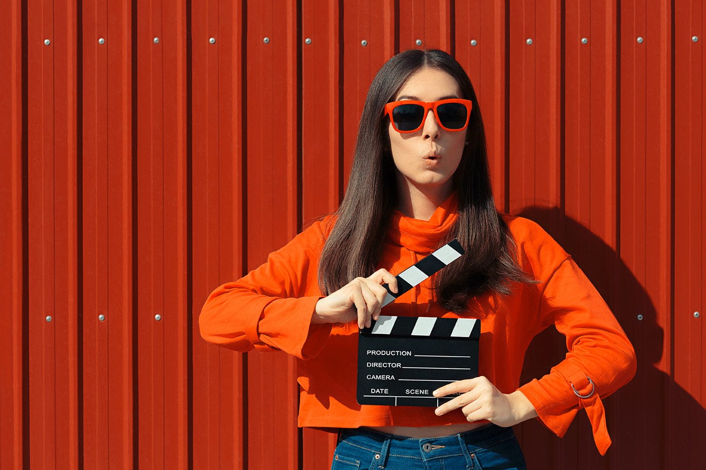 girl-with-clapboard girl with movie clapboard